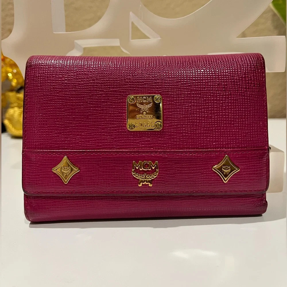 MCM DARK PINK TRIFOLD WALLET WITH MCM CHARM